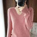 Switch Women&#39;s cashmere V-neck pullover sweater with long sleeves in pink. 1 image