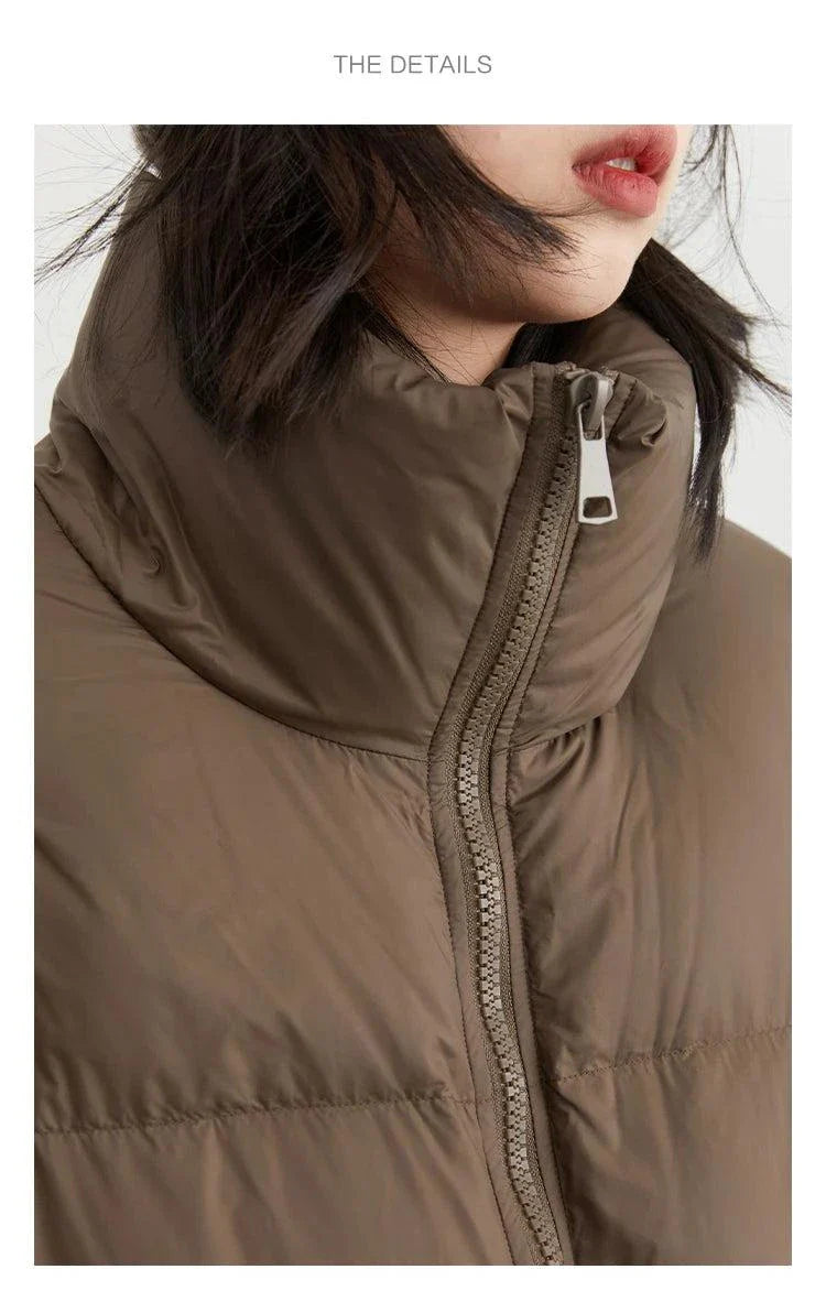 Women’s long down coat with zipper, thick and warm for autumn/winter, loose casual fit.