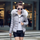 Switch Women&#39;s faux raccoon fur collar winter parka with zipper closure. 1 image