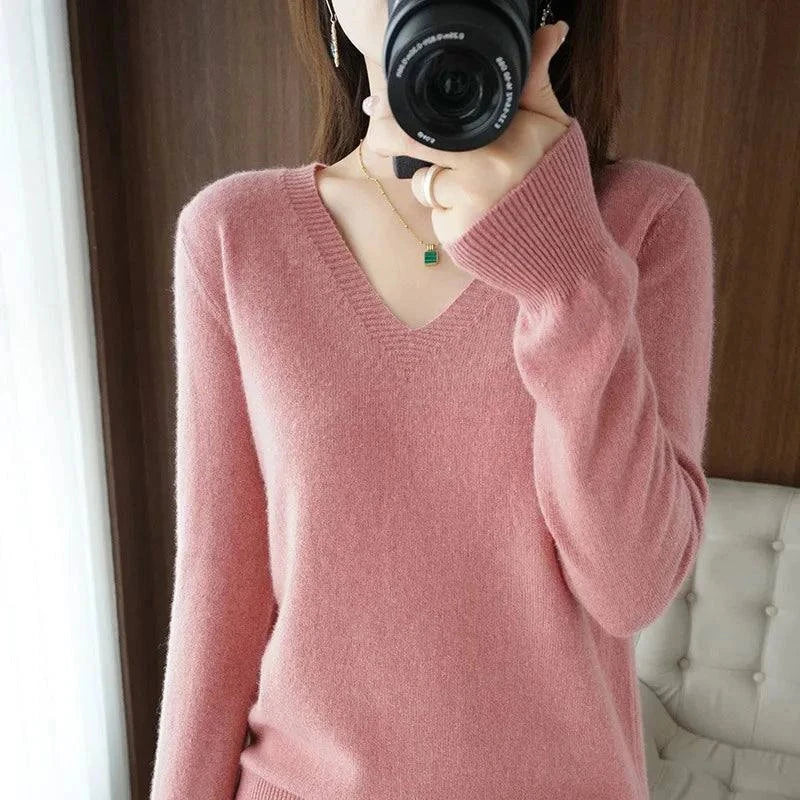 Cashmere women's V-neck pullover sweater with long sleeves and casual elegant design.