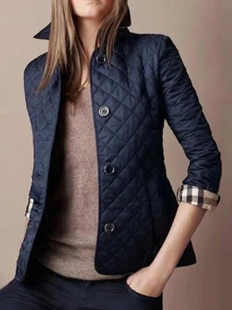 Quilted winter coat for women, elegant single-breasted jacket with turn-down collar.