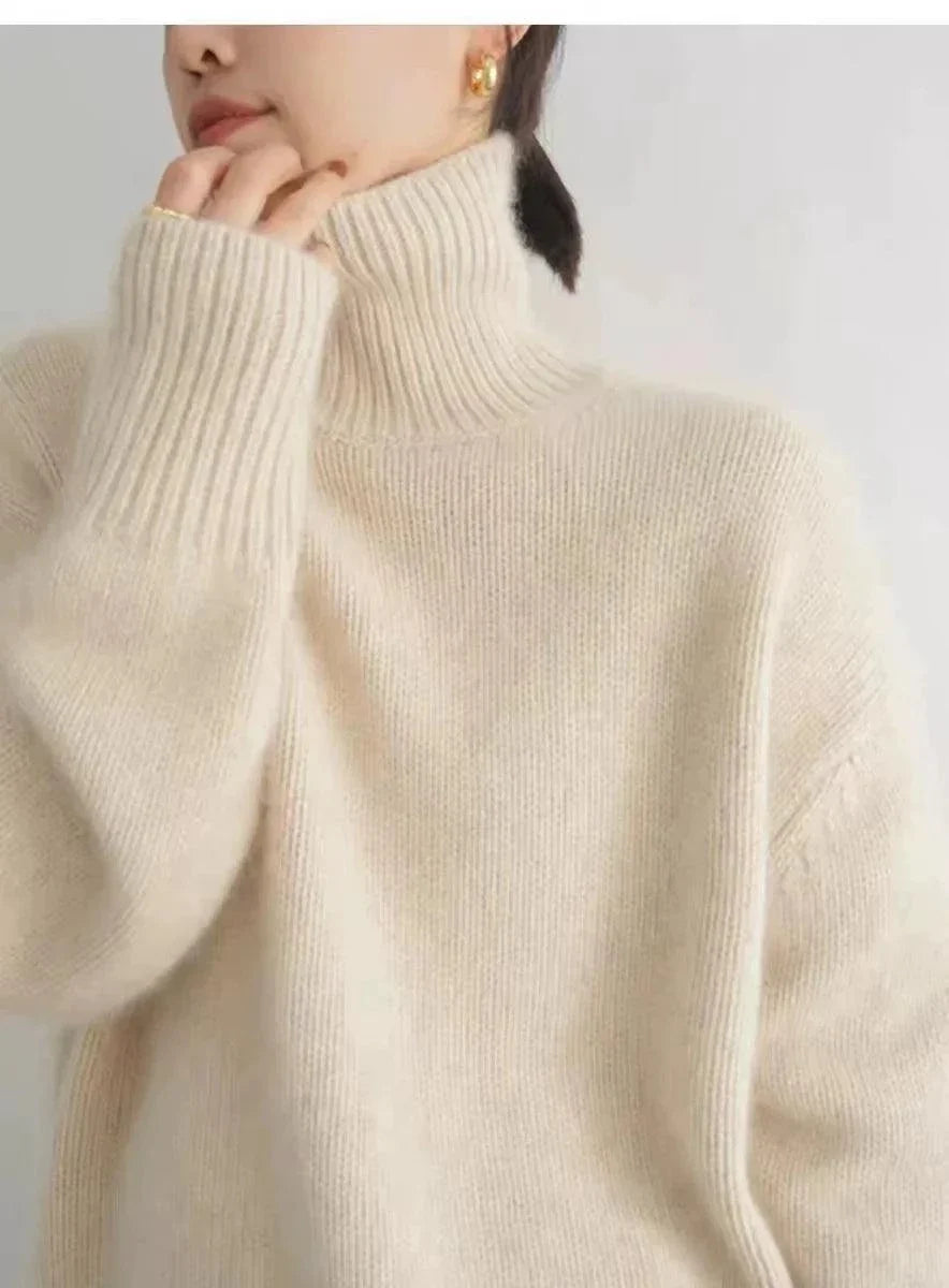 100% pure cashmere women's loose turtleneck winter wool sweater, minimalist design, beige.