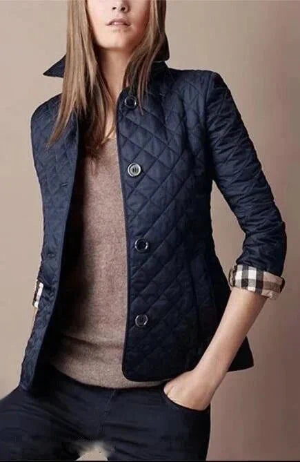 Quilted winter coat for women with single-breasted closure and turn-down collar.