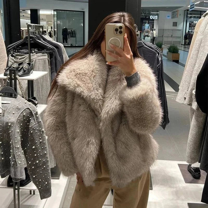 Fashionable winter gradient faux fur coat with big collar, perfect for high-street luxury style.