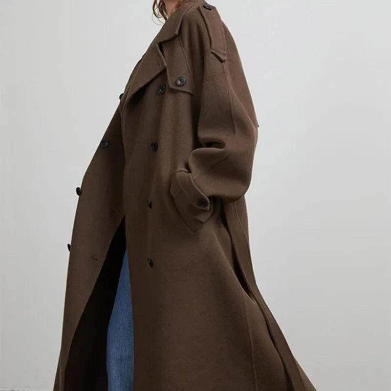 Elegant brown woolen overcoat with double-breasted design and loose lapel.