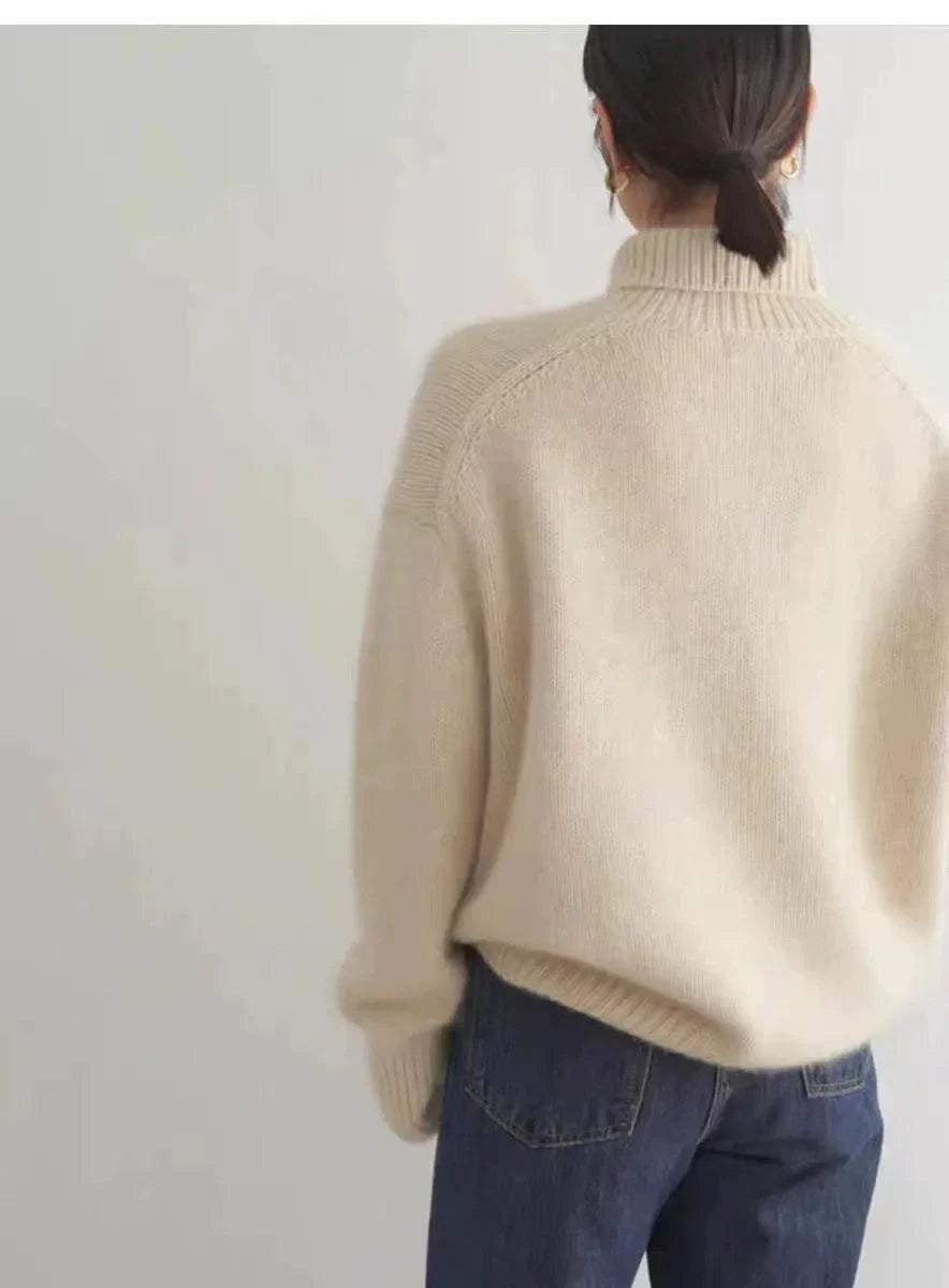 100% pure cashmere women's loose turtleneck sweater in beige, perfect for winter warmth and style.