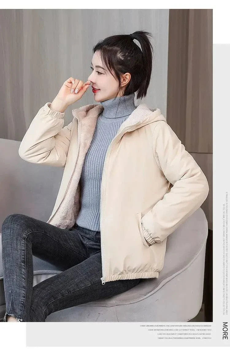 Women's winter fleece hooded jacket, windproof and cozy, ideal for casual outdoor activities.