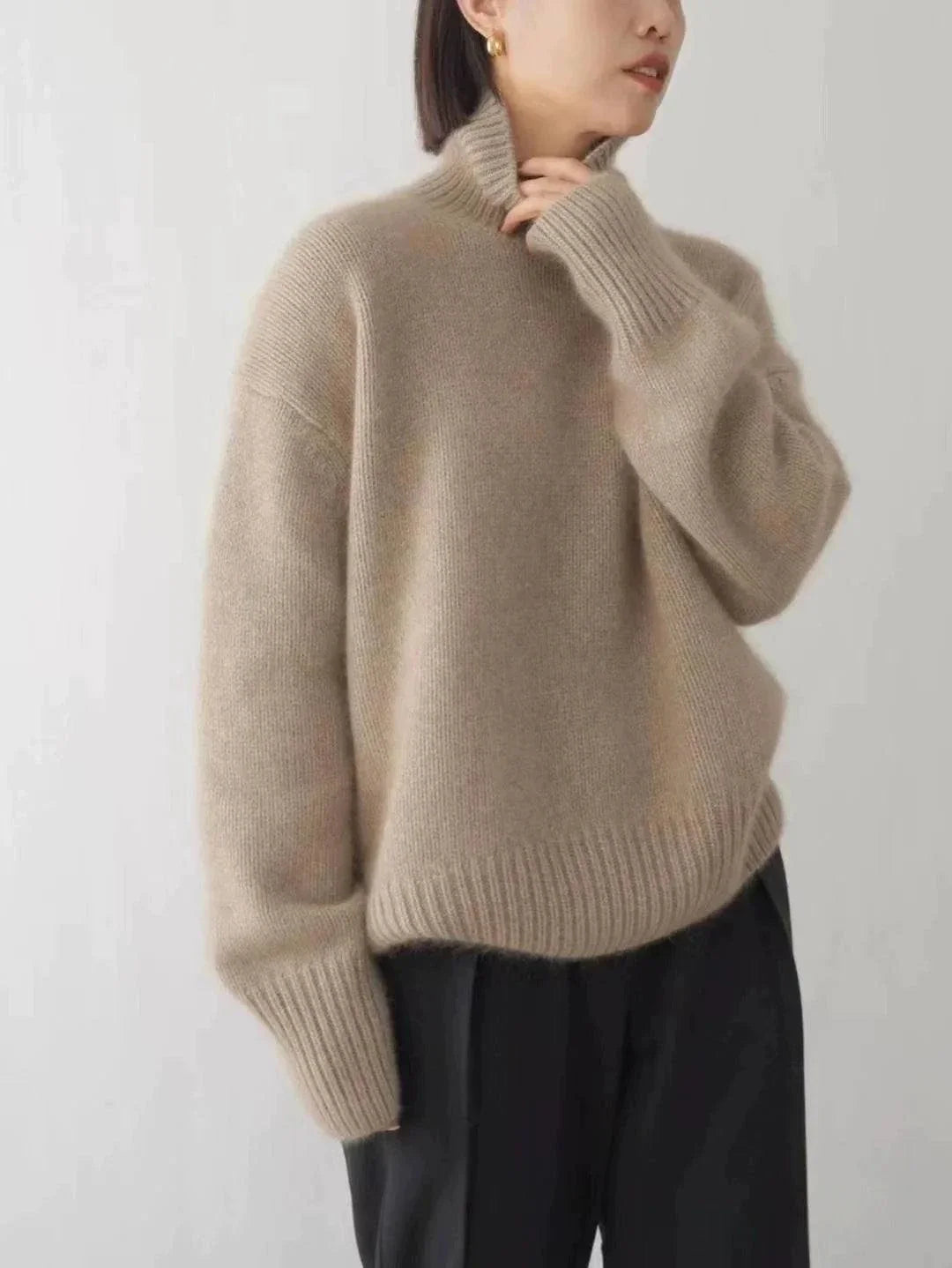 Women's 100% Pure Cashmere Turtleneck Sweater in beige, loose fit, perfect for winter warmth and style.