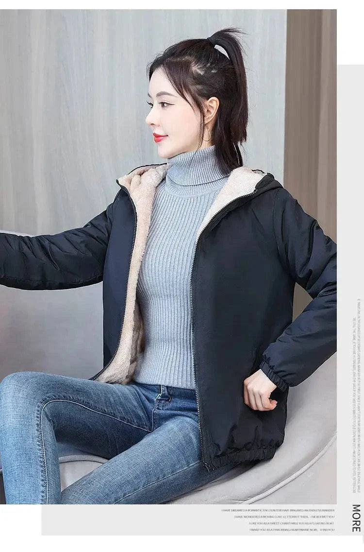 Women's winter fleece hooded jacket for cozy, stylish, and warm outdoor wear.