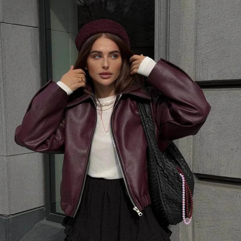 Women's vintage lapel leather jacket, chic autumn fashion, long sleeves, streetwear style with functional pockets and PU material.