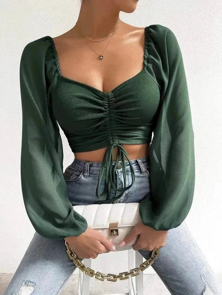 Chic V-neck crop tee with drawstring design in green, perfect for summer fashion.