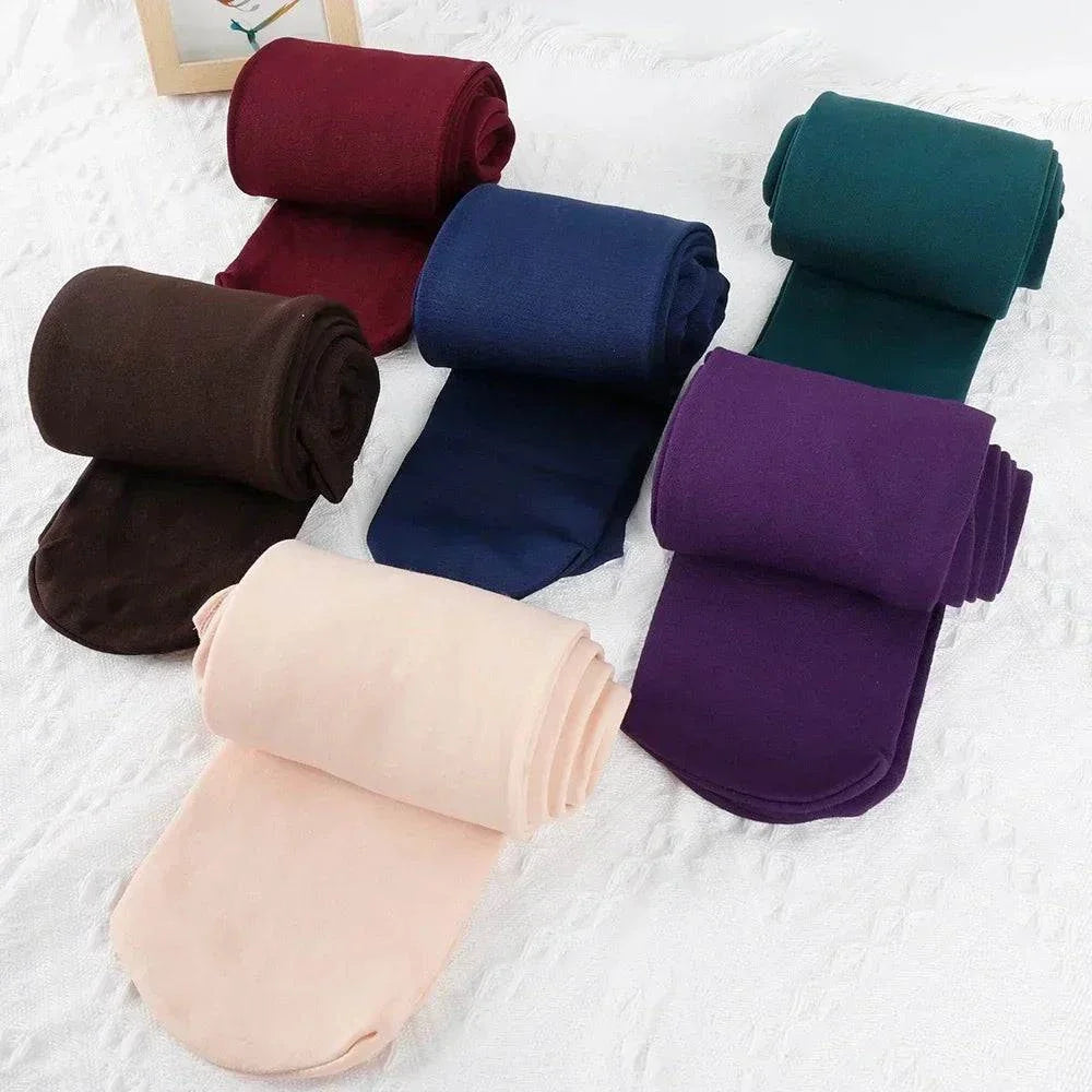 Women’s thermal stockings in multiple colors, fleece-lined for winter warmth, high-waist elastic fit.