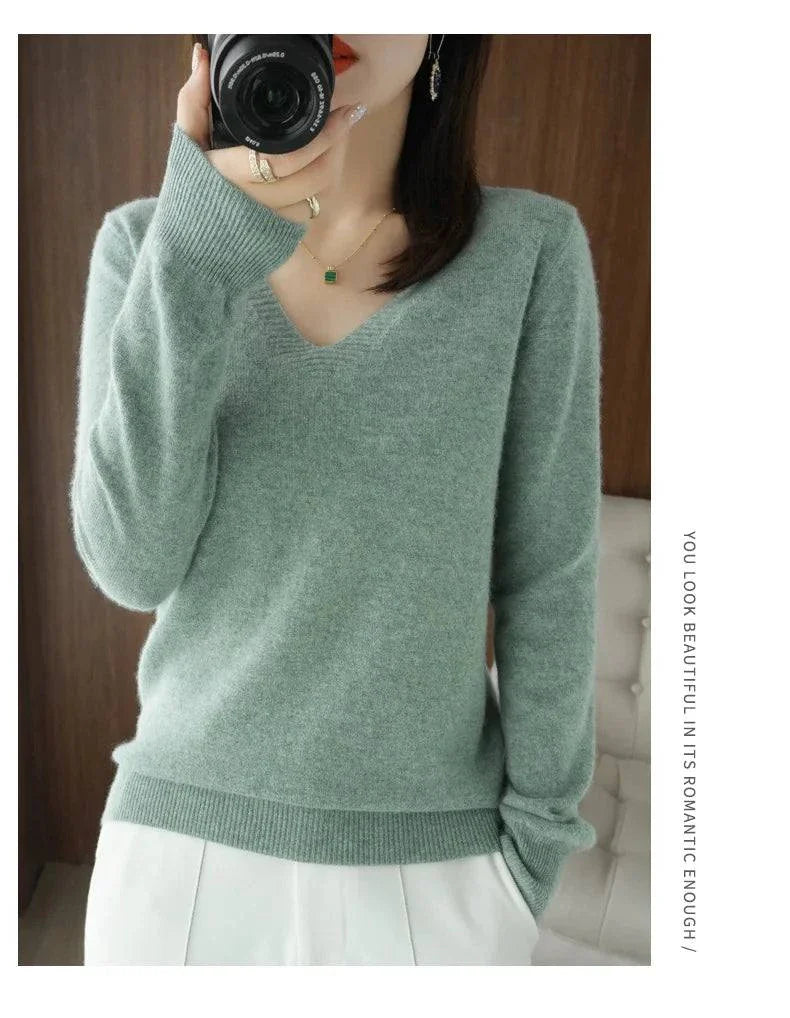 Cozy cashmere women's V-neck pullover sweater with long sleeves, showcasing casual elegance and intricate lace detailing.